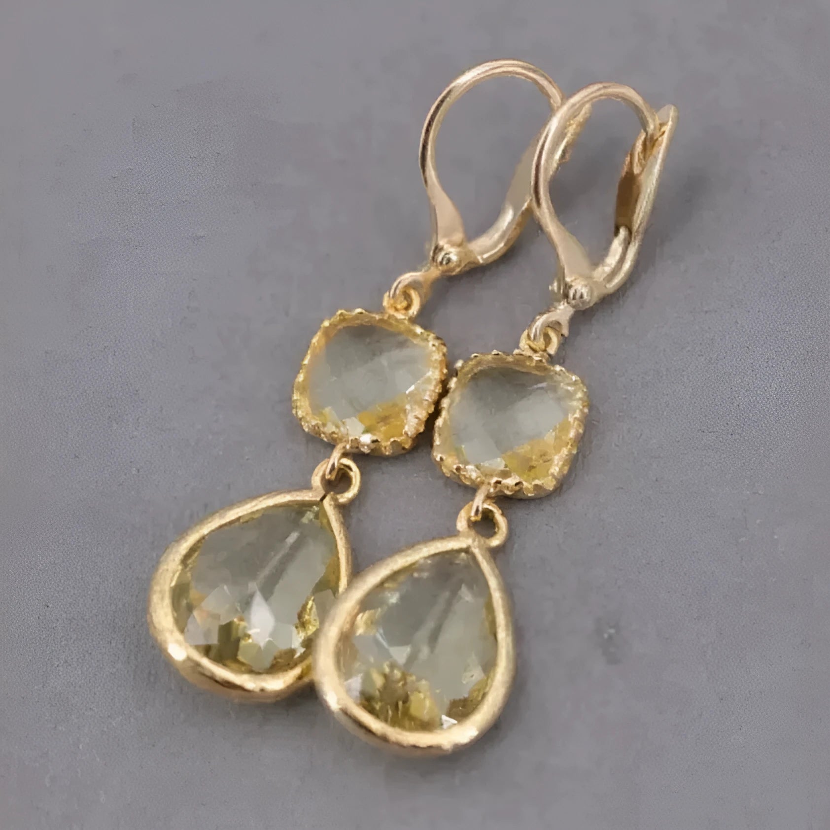Gold geometric fringe earrings with crystal water droplets on copper frame