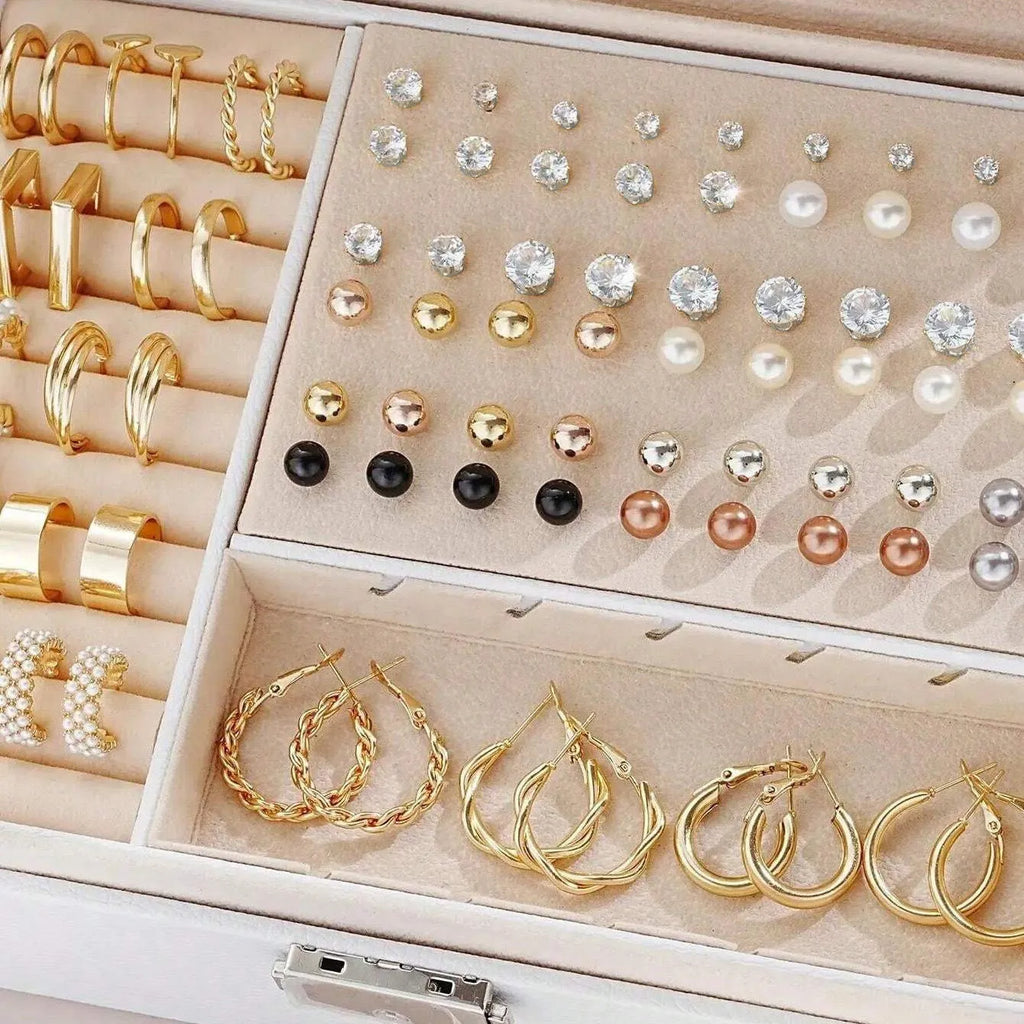 108-piece set of gold and yellow geometric round alloy pearl earrings for women on a plain background.