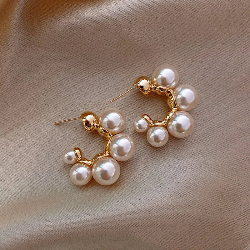 Red bell charm alloy earrings with pendant design, also available in white