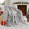American style soft plush flannel Christmas blanket in a choice of five colours, showing its texture.