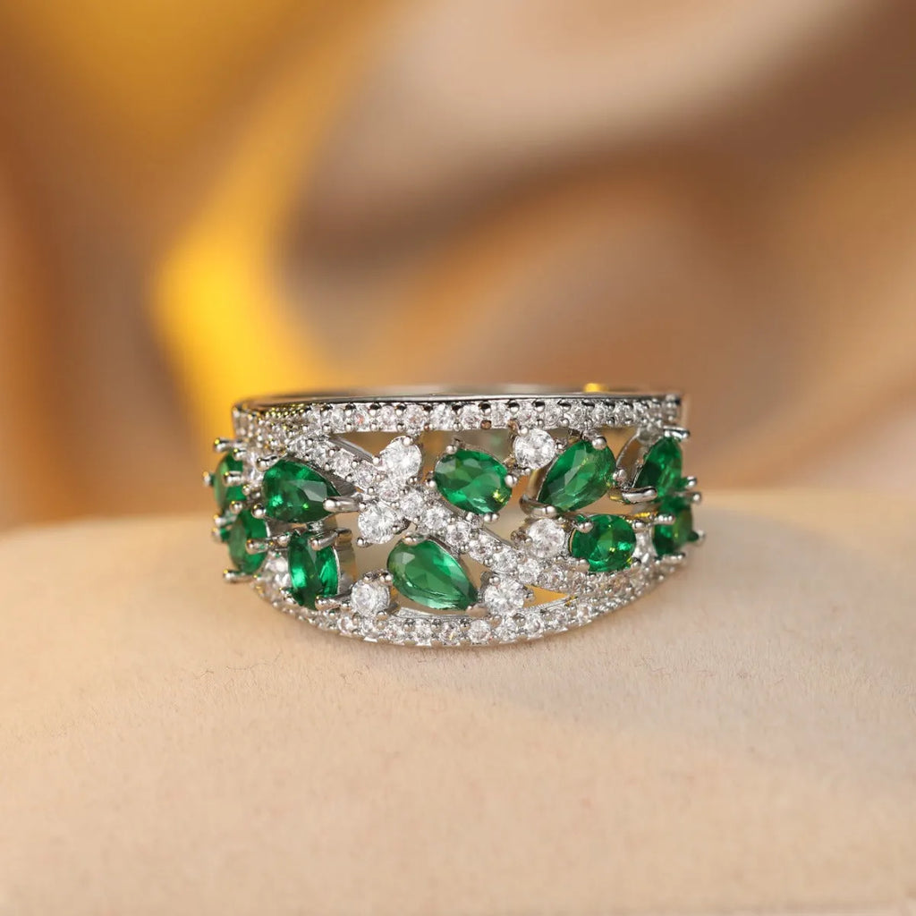 Women's round hollow fashion ring in copper with gemstone options, showing the openwork design.