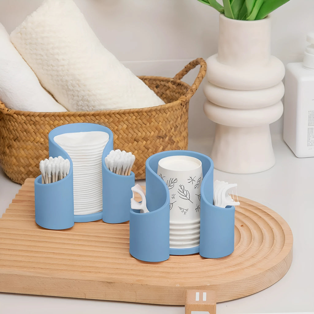 Modern plastic dental floss storage container in solid colours: pink, white, blue, black