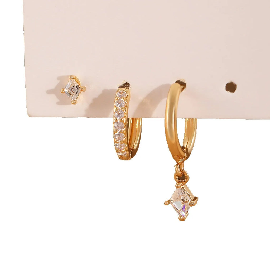 Ladies three-piece earring set with geometric designs and inlaid zircon stones in gold or white finish