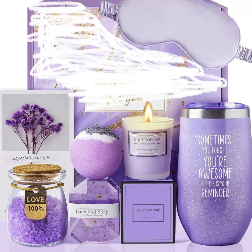 Aromatherapy gift box containing soy wax candles and bath products in modern simplicity design.