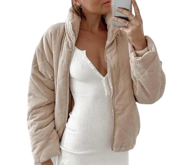 Women's apricot corduroy wadded jacket with stand collar and full-length front zipper showing street fashion styling
