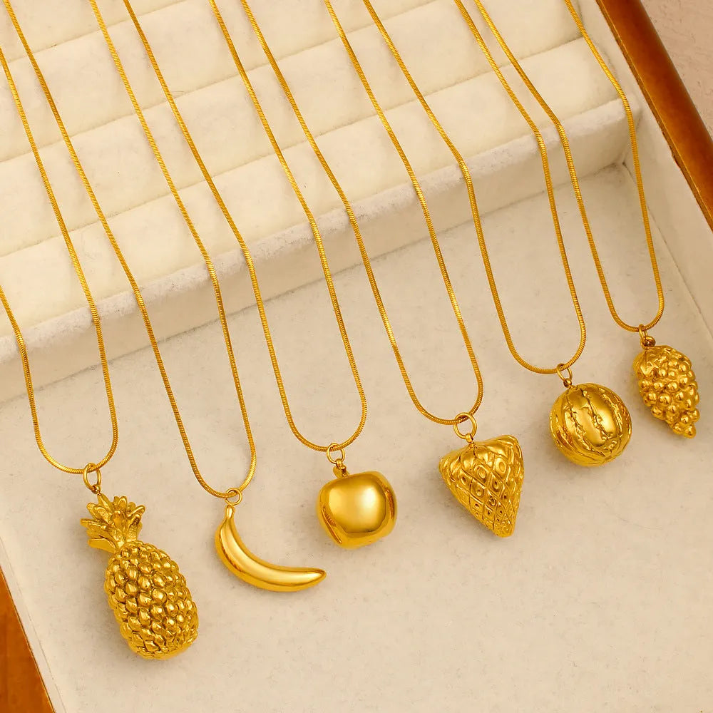 Stainless steel women's necklace with a detailed fruit charm pendant on a regular chain.