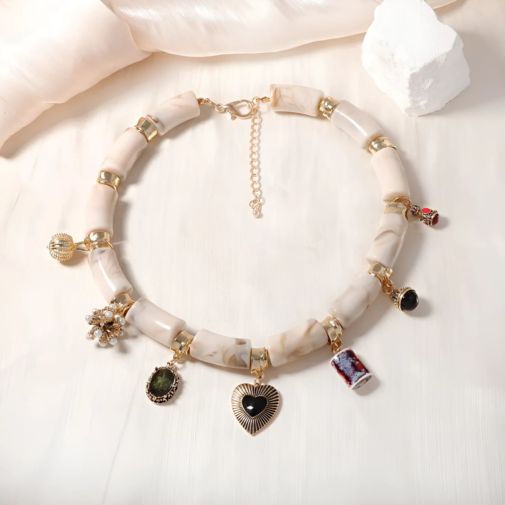 Heart-shaped resin bamboo pendant necklace with electroplated finish