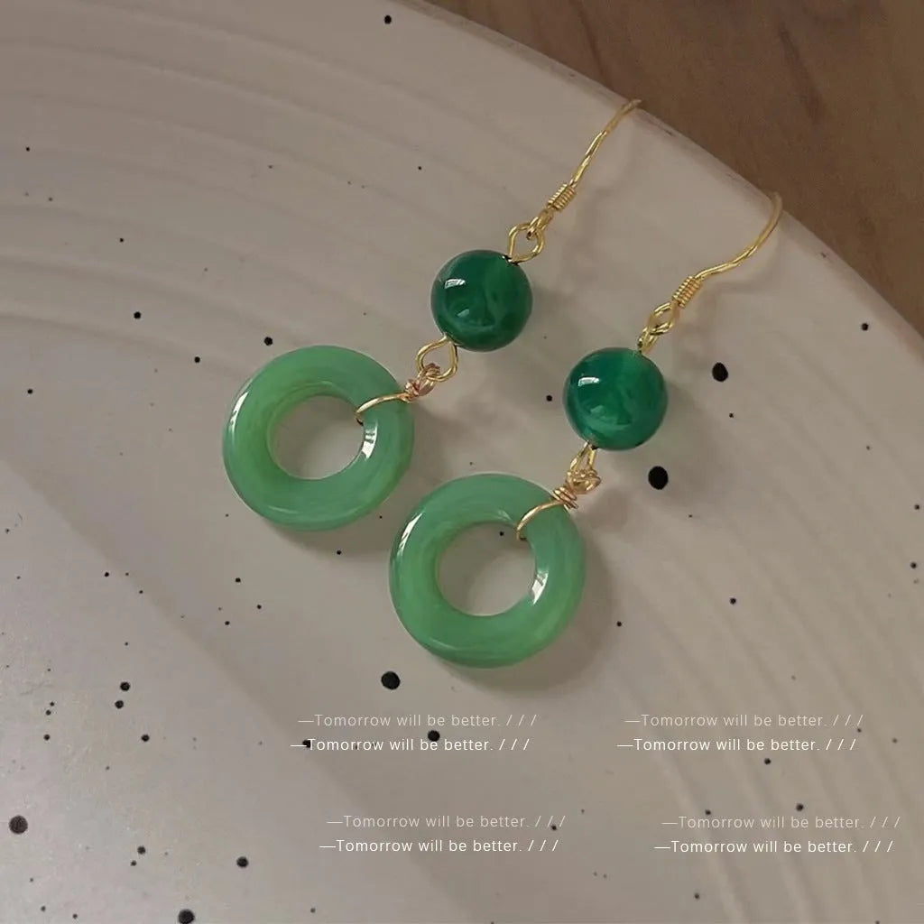Green zinc alloy earrings with Chinese peace buckle design and geometric pattern