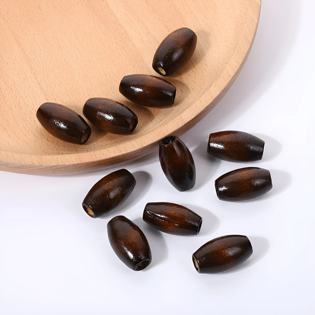 Oval M-shaped raised wooden bead in dark coffee colour, 25mm length, baking varnish finish