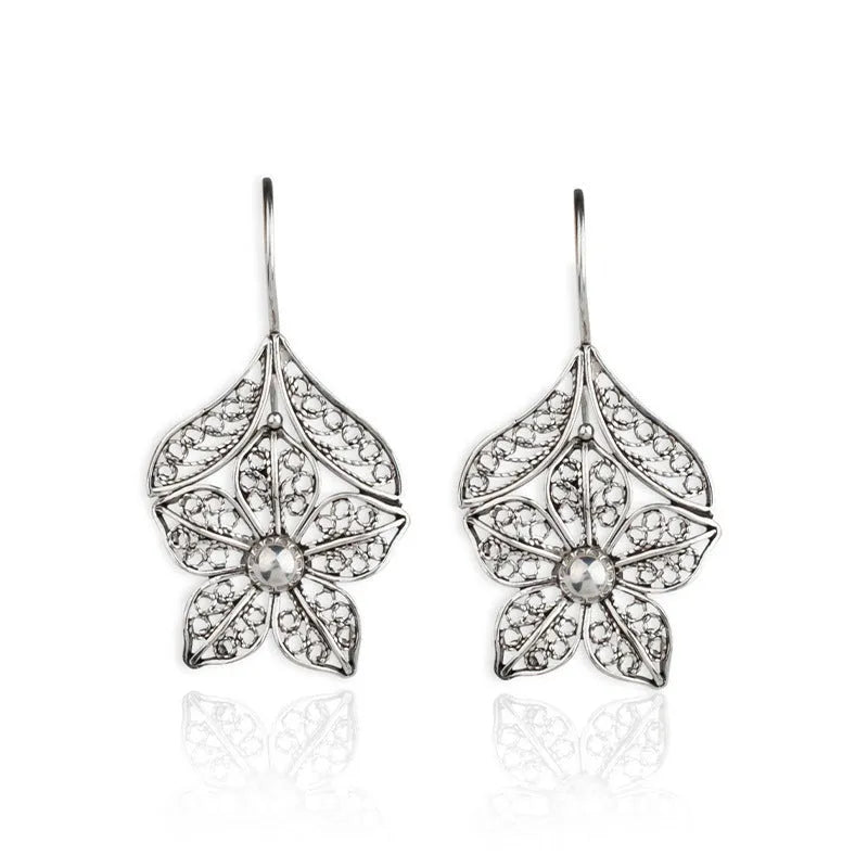 Silver alloy hollow flower leaf-shaped earrings for women retro simple style