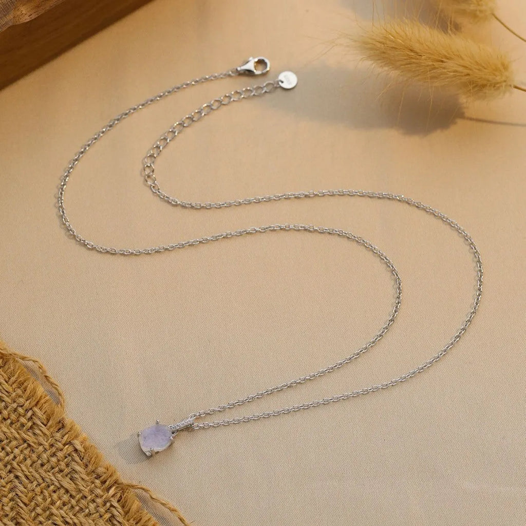 S925 sterling silver geometric moonstone pendant necklace with curb chain on white background