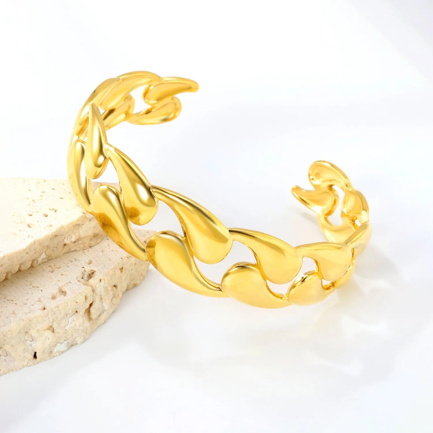Contemporary stainless steel and alloy bracelet in European-American style on a wrist.