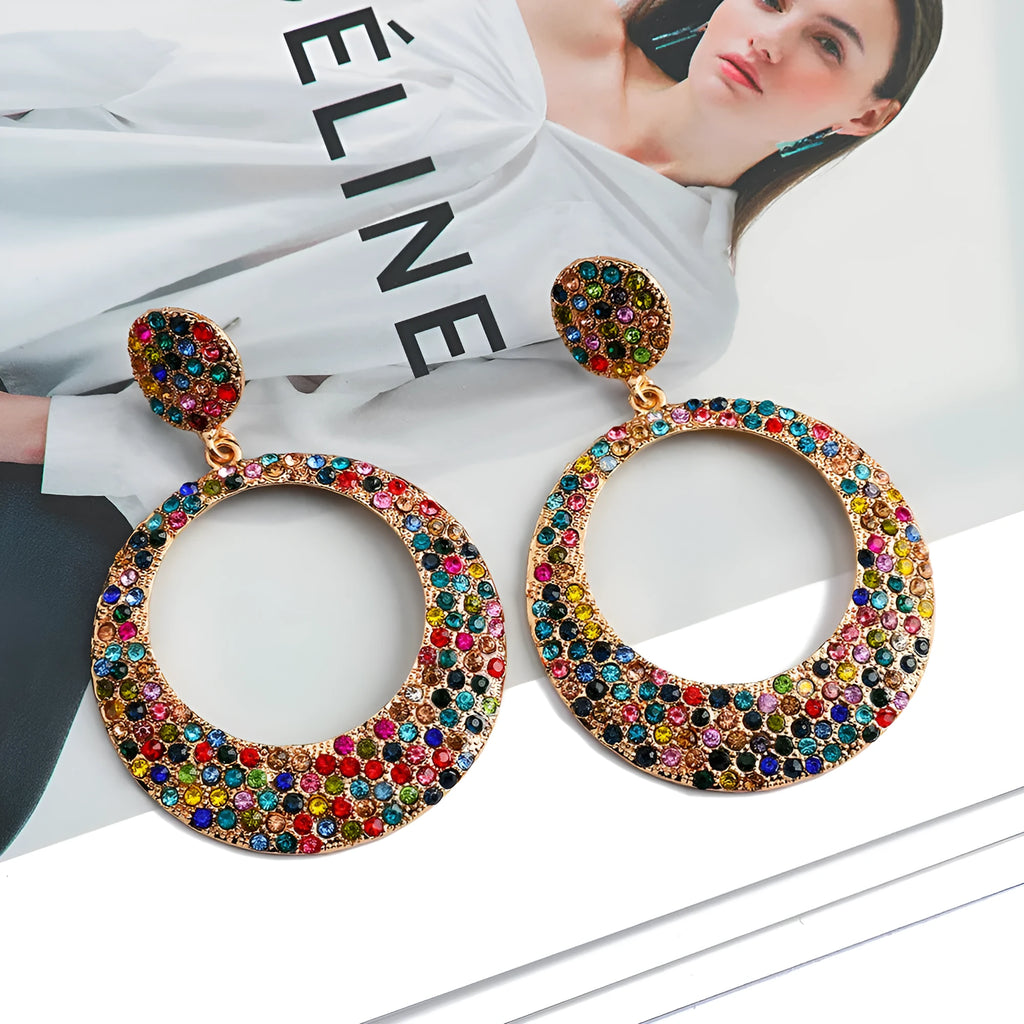 Colourful cartoon style metal earrings with round diamond shapes and large pendant design