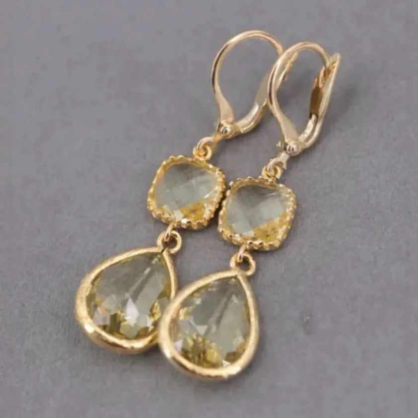 Gold geometric fringe earrings with crystal water droplets on copper frame
