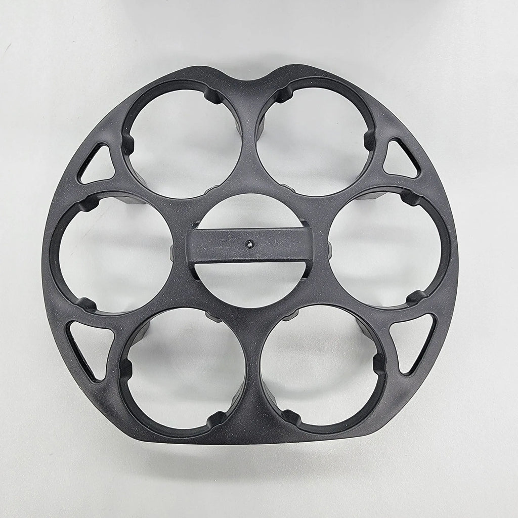 Black plastic egg storage rack with modern design on a kitchen counter