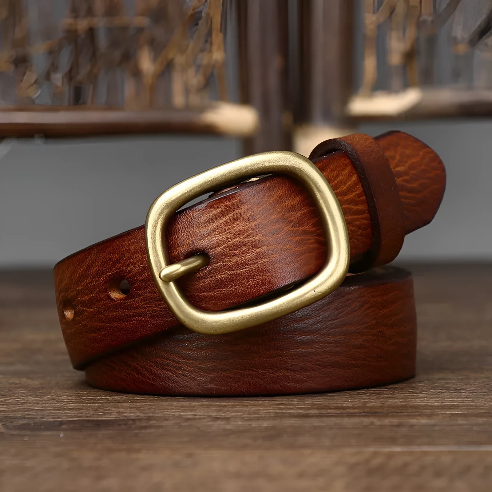 Handmade genuine leather belt with antique copper buckle, 2.8cm wide, 4mm thick, 120cm length, in black colour on wooden surface