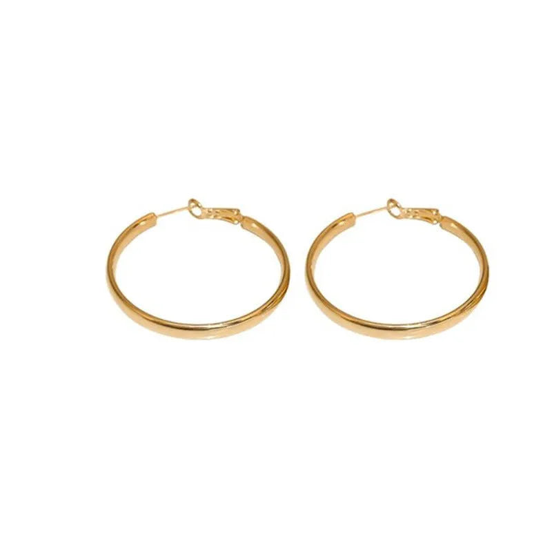 Copper circle earrings with 40mm diameter and electroplated gold or silver finish