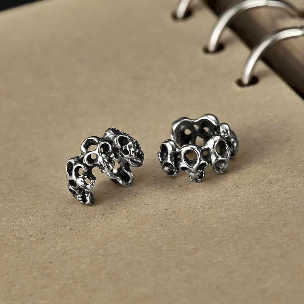 Retro hollow skull stainless steel clip-on earrings with geometric design