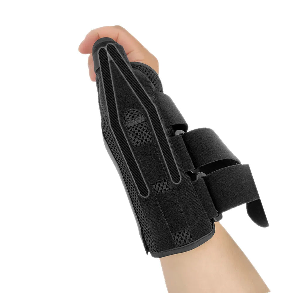 Black sports wrist guard with carbon fibre panel and adjustable thumb strap for weightlifting support