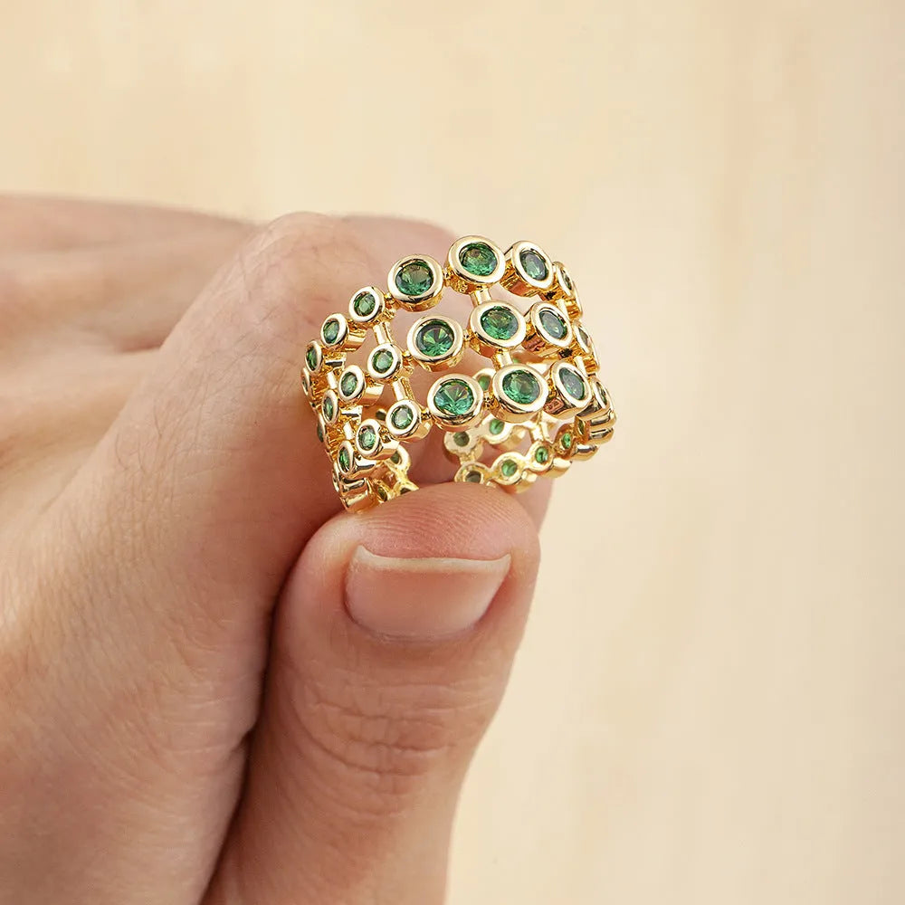Copper ring with 18K gold plating and green zircon stones in wide band unisex design