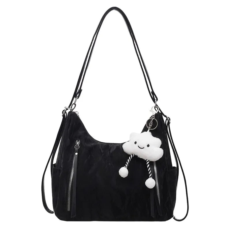 Women's soft PU backpack in blue with a matching detachable pendant for convertible carry