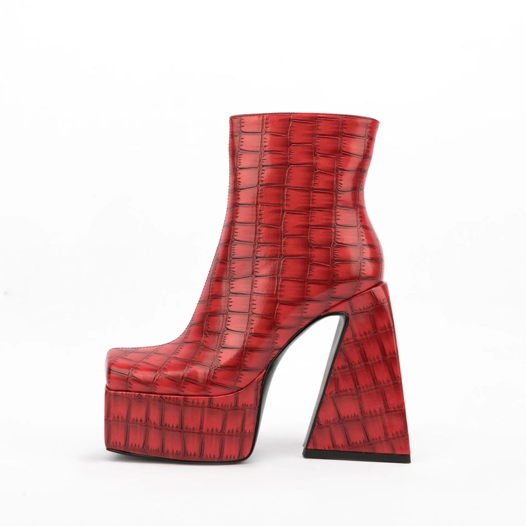 Women's ankle boot with a high heel, shown in a solid colour like beige, brown, red, green, or black.