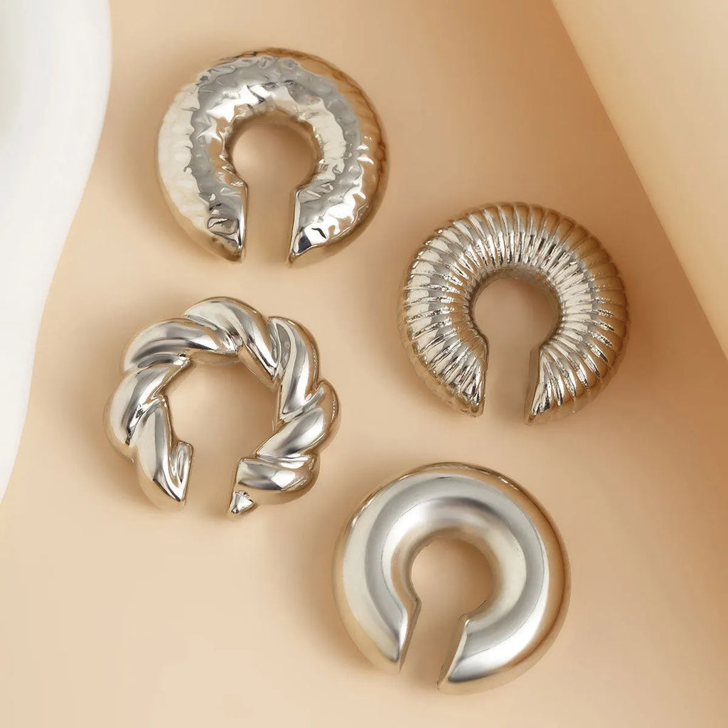 Geometric ear clip set in gold and silver colours for women without pierced ears