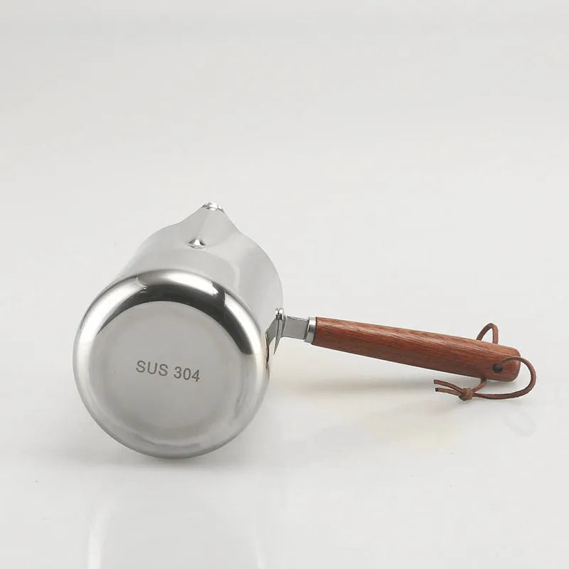 Stainless steel coffee cup with wooden handle, garland design, in modern simple style.