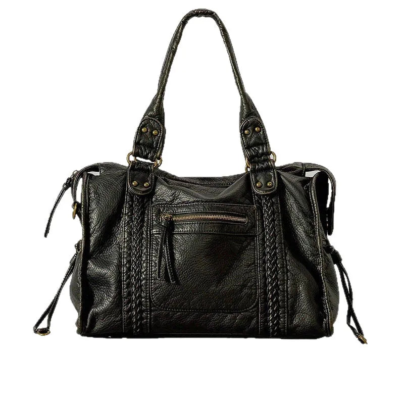 French retro women's motorcycle messenger bag in brown with weaving pattern detail and single shoulder strap