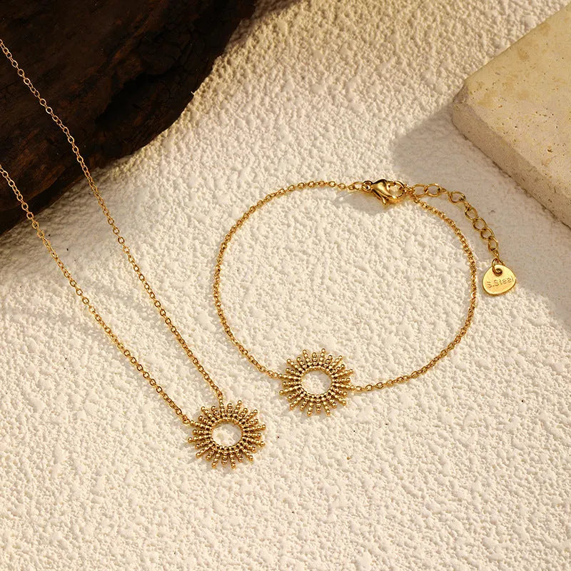 SUNFLOWER series women's gold geometric chain necklace and bracelet jewellery set on display