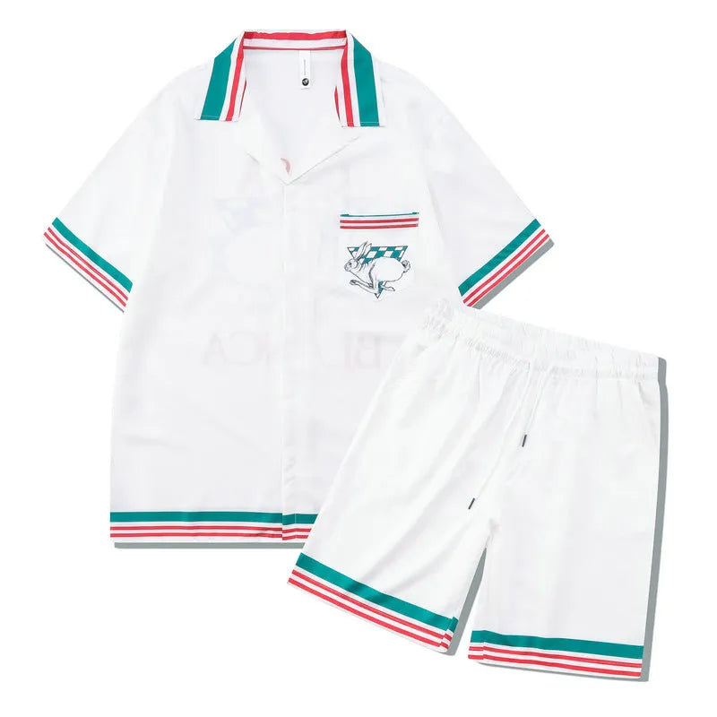 Plaid printed beach outfit set for men and women, featuring a short sleeve shirt and matching trousers.