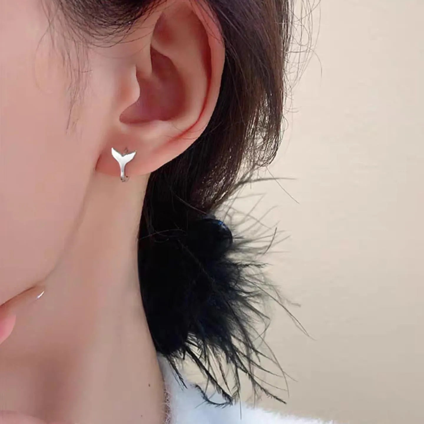 Women's fashion fishtail earrings in white gold and yellow gold colour options