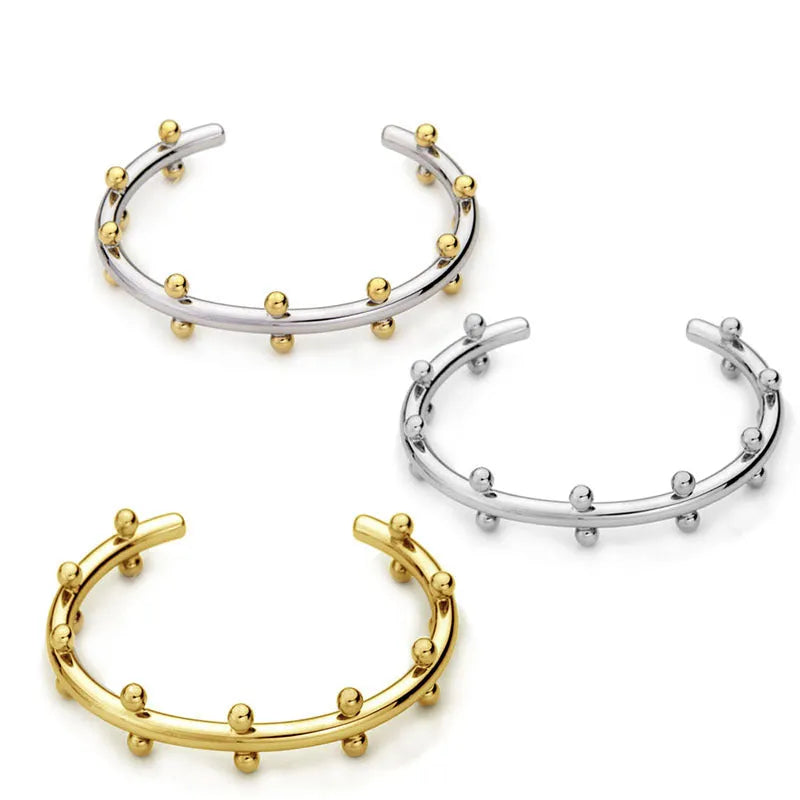 Stainless steel C-shaped bracelet with textured rivet bean beads and adjustable alloy chain