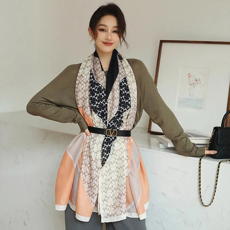 Women's printed polyester scarf showing 180cm length and 90cm width dimensions with autumn-appropriate design