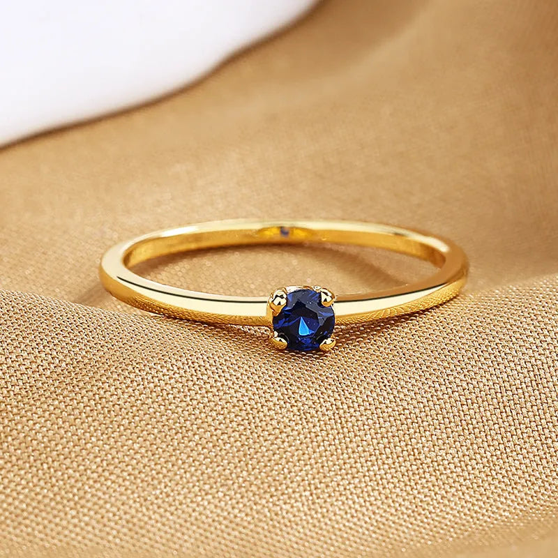 Copper women's ring with single diamond in circular geometric setting in choice of colours