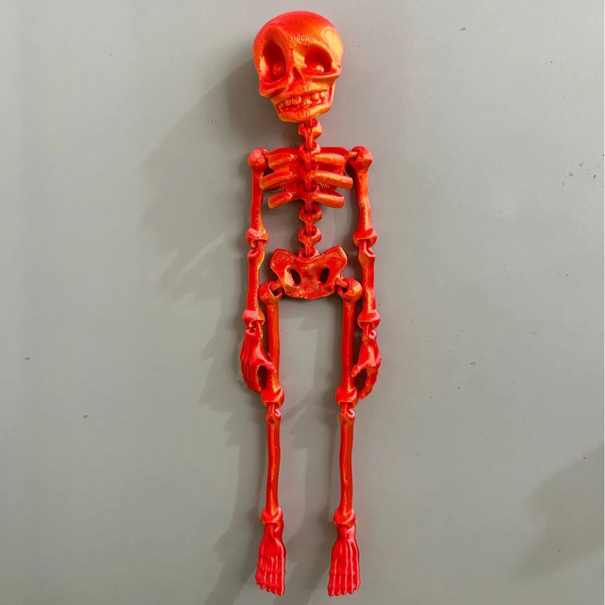 3D printed PLA skull refrigerator magnet ornament in multiple colour options measuring 18cm high