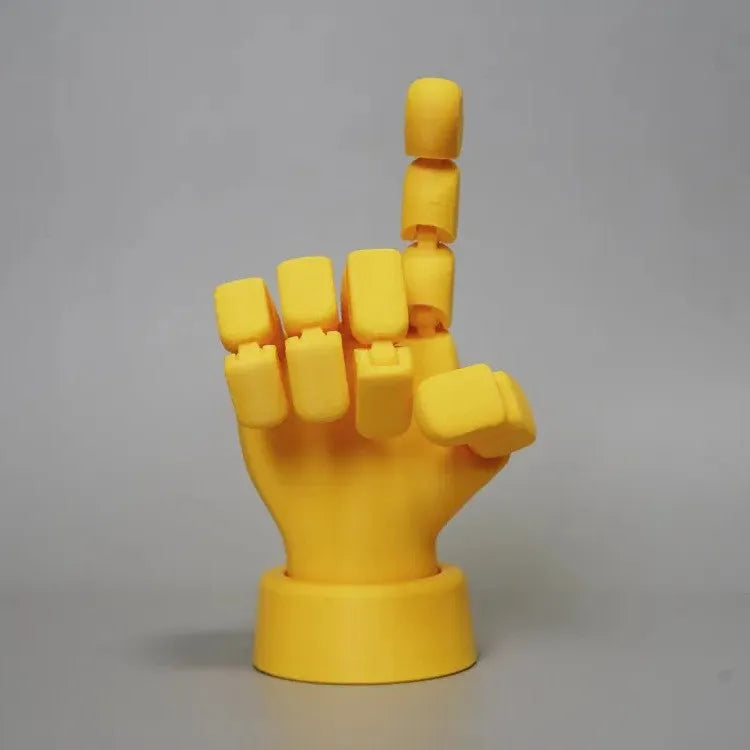 Yellow PLA movable joint hand props ornament with articulated fingers on white background