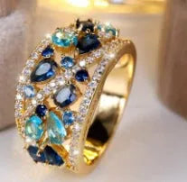 Women's round hollow fashion ring in copper with gemstone options, showing the openwork design.