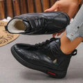 Women's black velvet plimsoll with non-slip rubber sole and hollow-out detailing