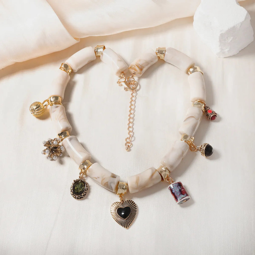 Heart-shaped resin bamboo pendant necklace with electroplated finish