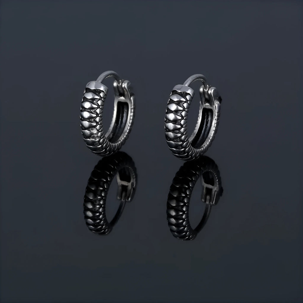 Silver geometric twist earrings with striped pattern on stainless steel