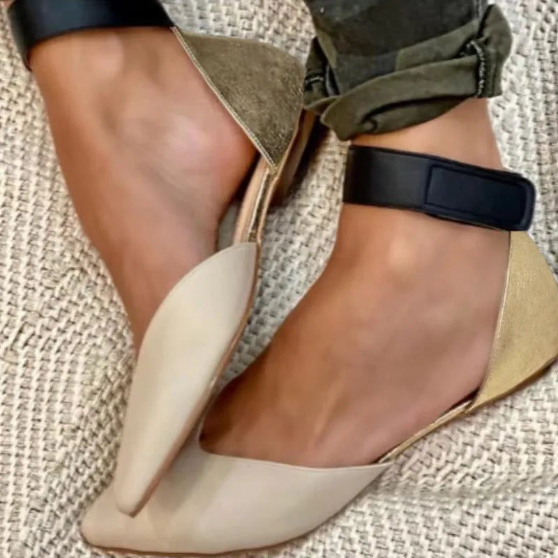 Women's velcro fastening sandals with hollowed pattern design in beige colour showing flat heel