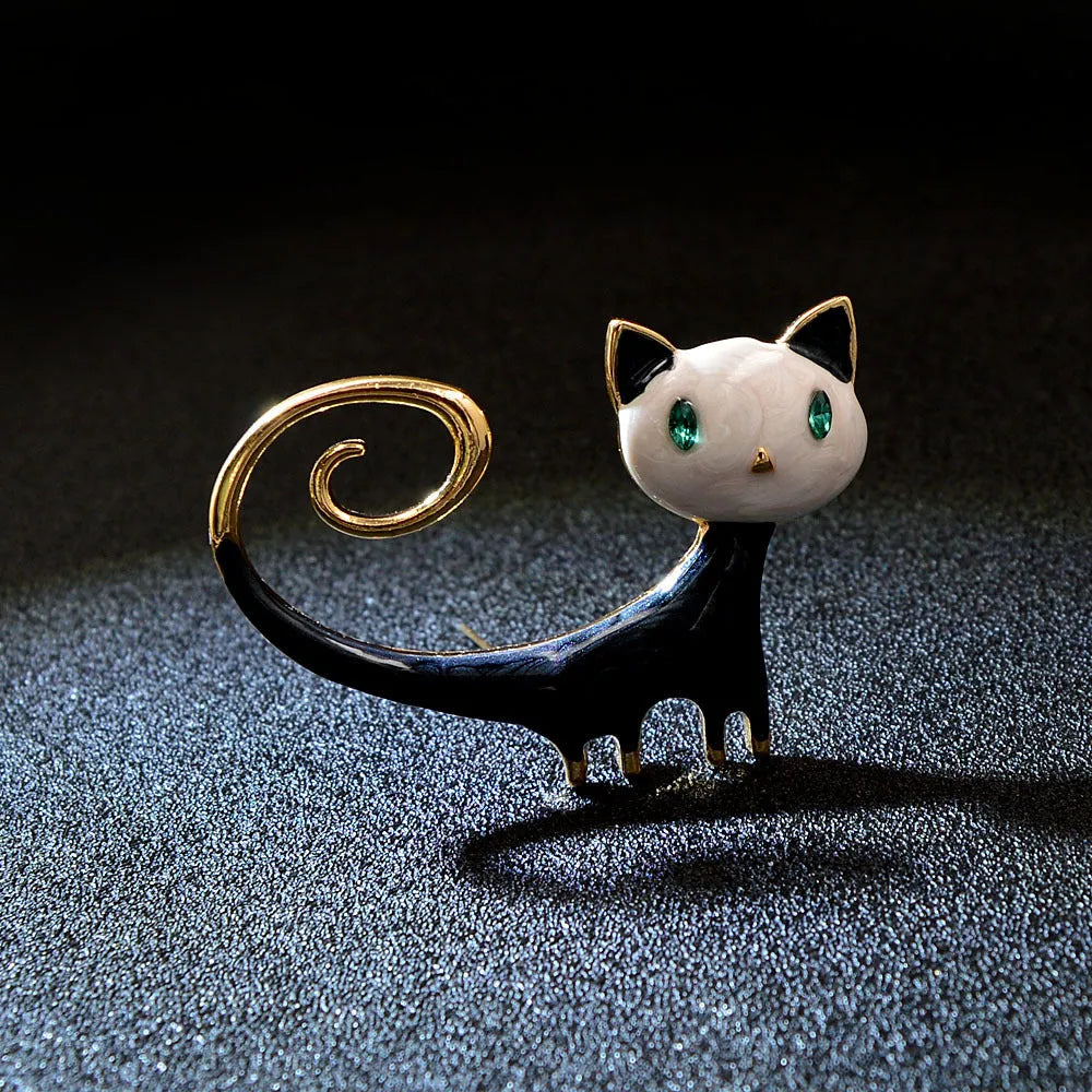 Personalised painted cat brooch in alloy metal showing white and orange colour options