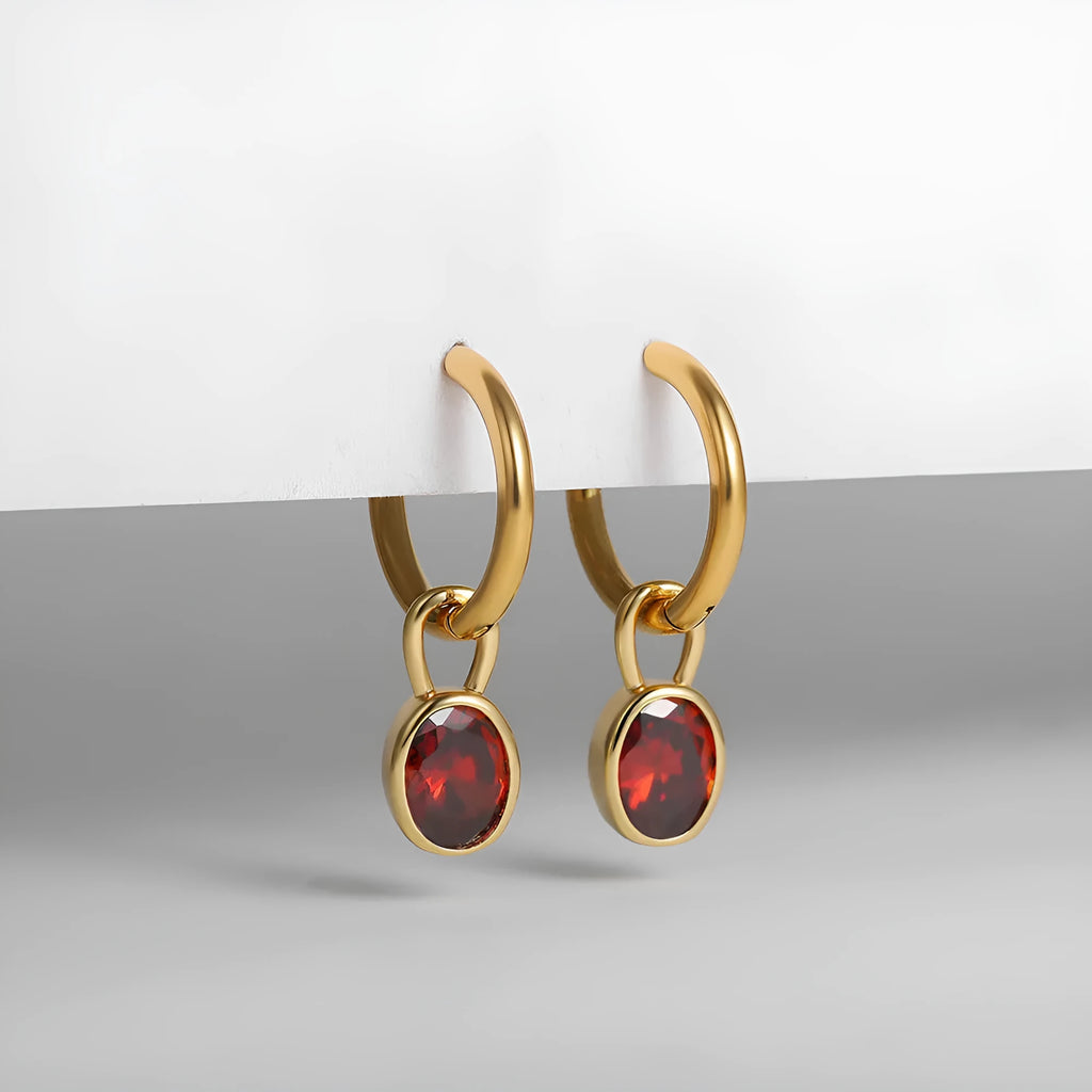 Women's copper oval zircon earrings in retro style, showing colour options including emerald and army green.