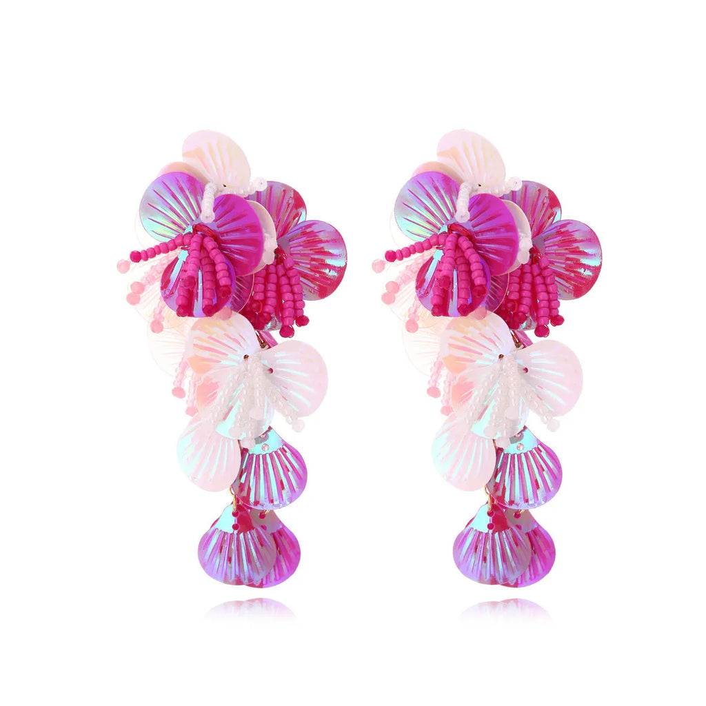 Handmade colourful string bead flower and leaf earrings in exaggerated dopamine style.