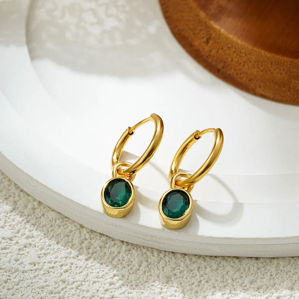 Women's copper oval zircon earrings in retro style, showing colour options including emerald and army green.