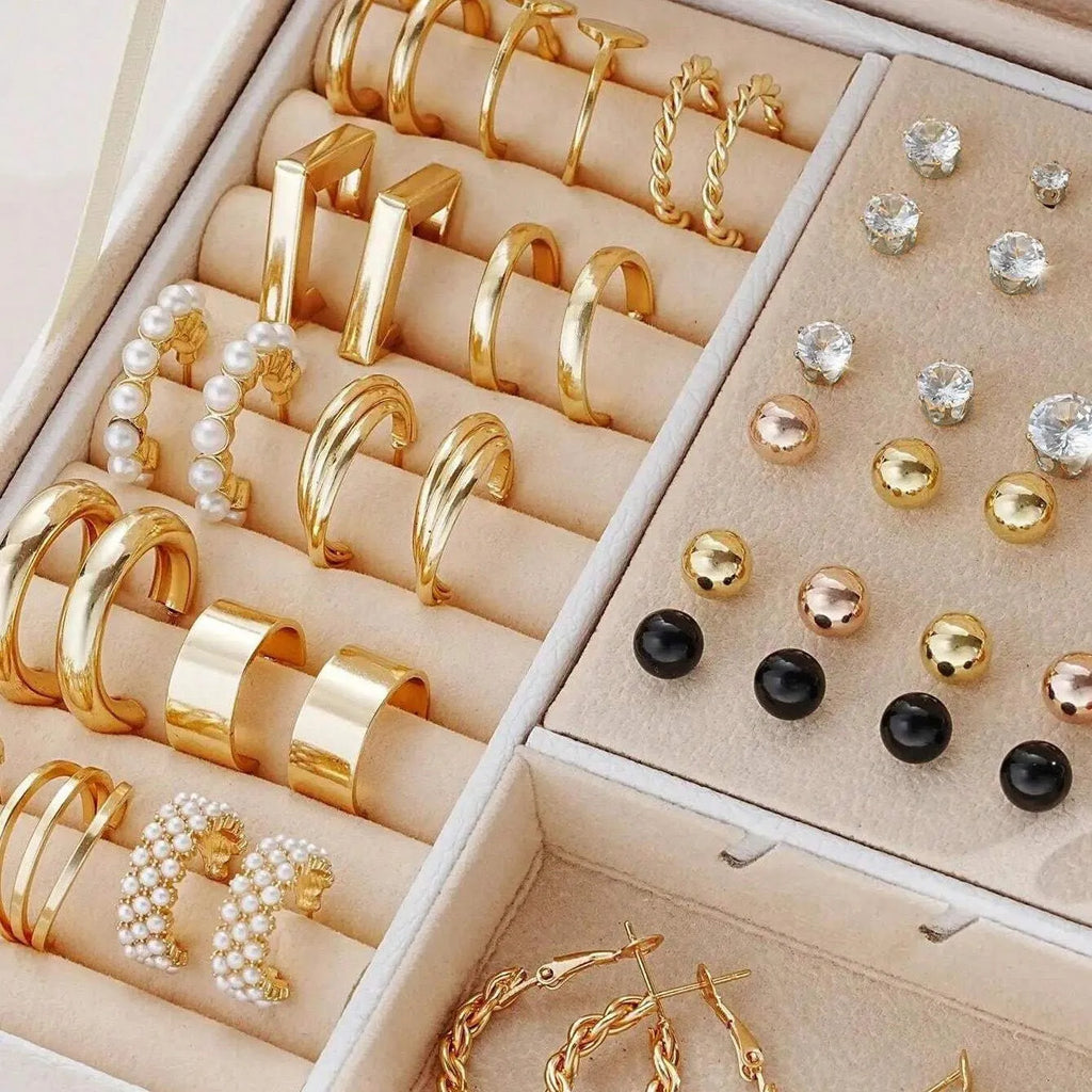 108-piece set of gold and yellow geometric round alloy pearl earrings for women on a plain background.