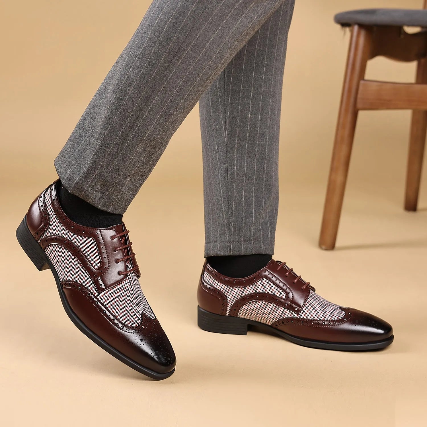 Men's black houndstooth patterned canvas lace-up casual shoes with a rubber sole.