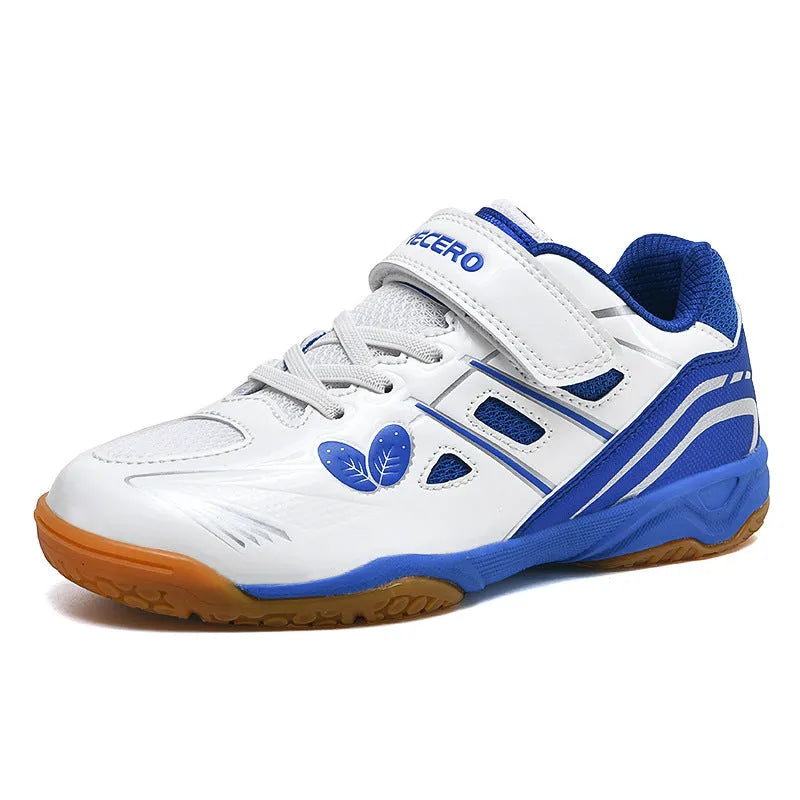 White and blue low-top badminton shoes with ribbed sole and round toe