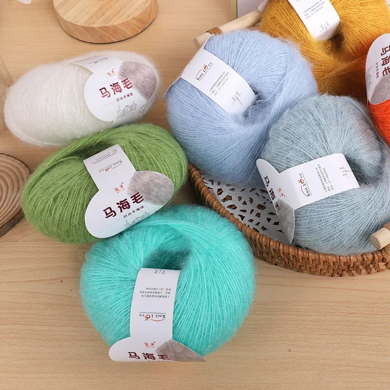 Mohair scarf DIY kit with wool ball of Inverness thread yarn showing multiple colour options for hand-woven spring accessories